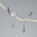 Double Sided Twist Drop Earrings